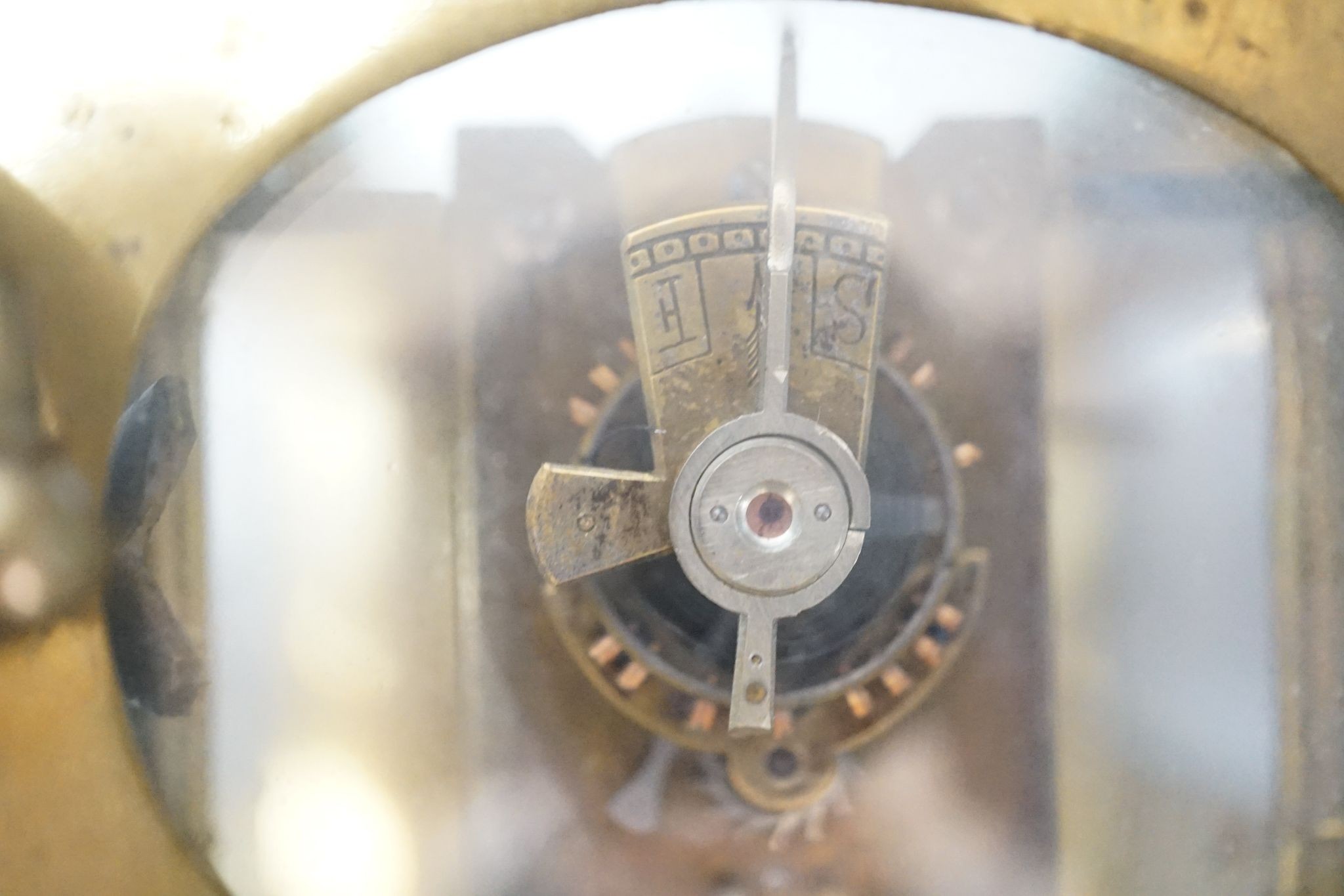 A cased brass carriage timepiece, 10.5 cms high high not including case.